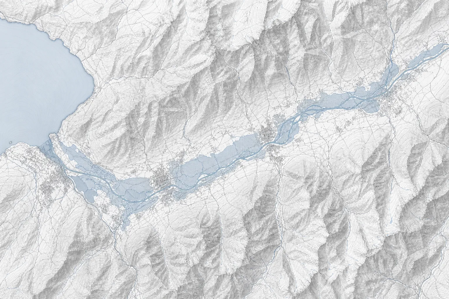 Topographic map of the Rhône valley in Switzerland, with the flooded area shaded blue along the valley floor from Lake Geneva eastward, covering the river and the settlements along it between the surrounding mountains.